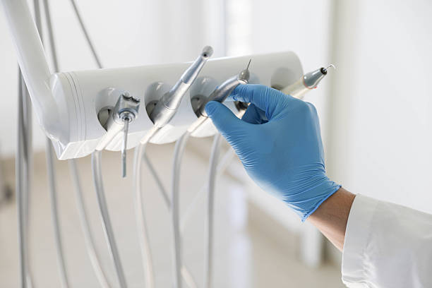 Professional Root Canal Treatment technician working in Mounds, OK